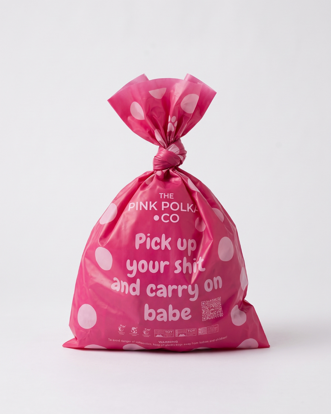 Pink Polka Co tied poo bag